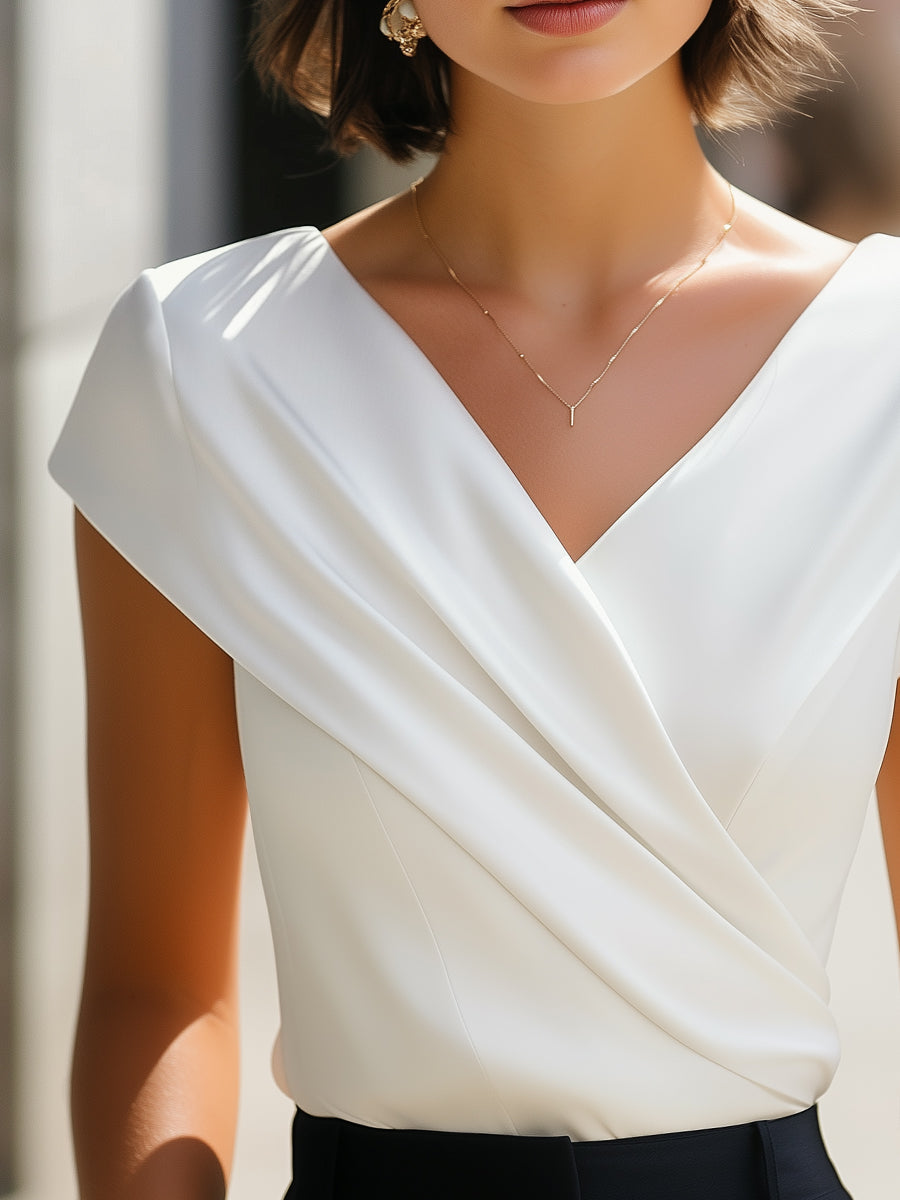 Romée - Elegante Mouwloze Vlindervorm Blouse met V-hals en Plooien